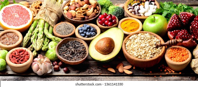 Superfoods, Vegetables, Fruits, Seeds, Legumes, Nuts And Grains For Vegan And Vegetarian Eating. Clean Eating. Detox, Dieting Food Concept. Panorama. Banner.