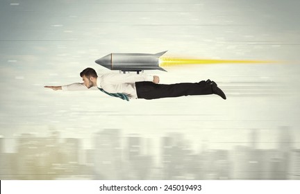 Superhero Business Man Flying With Jet Pack Rocket Above The City Concept