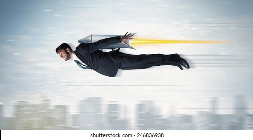 Superhero Business Man Flying With Jet Pack Rocket Above The City Concept