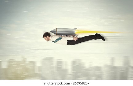 Superhero Business Man Flying With Jet Pack Rocket Above The City Concept