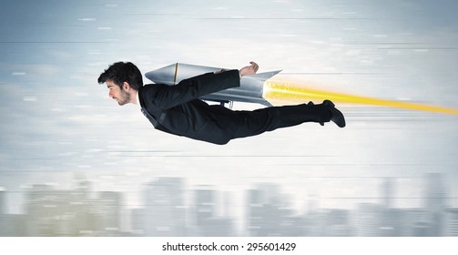 Superhero Business Man Flying With Jet Pack Rocket Above The City Concept