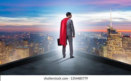 Superhero businessman on top of building - Powered by Shutterstock