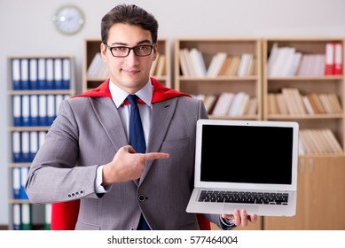 Superhero businessman working in the office - Powered by Shutterstock