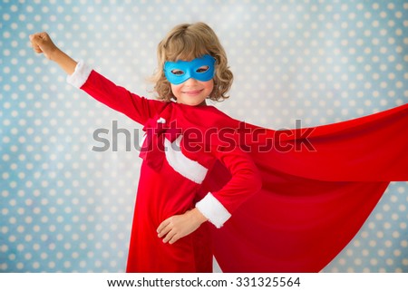Superhero kid at home. Christmas holiday concept