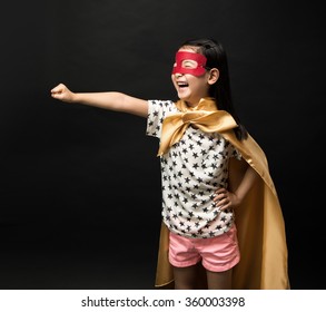 Superhero Kids On A Black Background