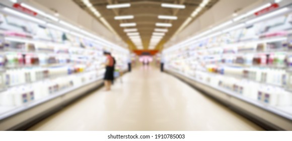 Supermarket Aisle With Dairy Products In Refrigerator Blur Background