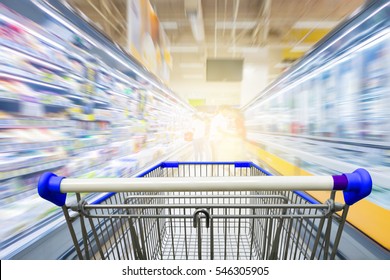 Supermarket Aisle With Empty Blue Shopping Cart