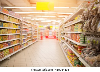 Supermarket Aisle and Shelves in blurry for background - Shutterstock ID 410044498