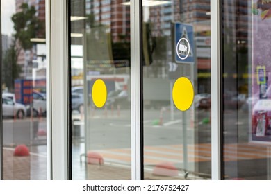 Supermarket Automatic Glass Doors With Camera Sign Closeup.