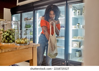 Supermarket, Avocado And Shopping Fruit At Shop, Buy Healthy Food And Retail Items At Grocery Store. Woman Picking, Choosing And Picking Groceries, Fresh And Produce At A Market For Diet Or Nutrition