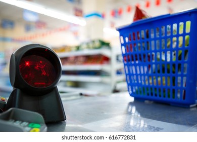 Supermarket Checkout Counter, Code Scanner And Shopping Baskets