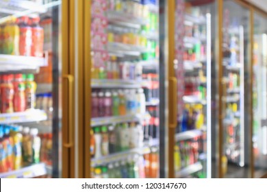 Supermarket Convenience Store Refrigerators With Soft Drink Bottles On Shelves Abstract Blur Background