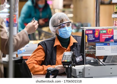 Supermarket Employee In Wearing Protective Mask As A Preventive Measure Against The Coronavirus COVID-19 In One Of Kyiv's Supermarkets. Kyiv, Ukraine On April 16, 2020