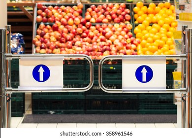 Supermarket Entrance With Background Of Fruits Baskets