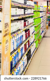 Supermarket Shelves With Shampoo And Body Care Products.