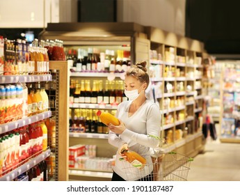 Supermarket Shopping, Face Mask And Gloves,Woman Choosing A Dairy Products At Supermarket