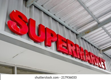 Supermarket Sign On Building