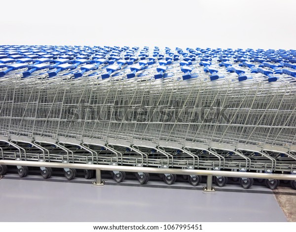 Supermarket trolley in\
shop.
