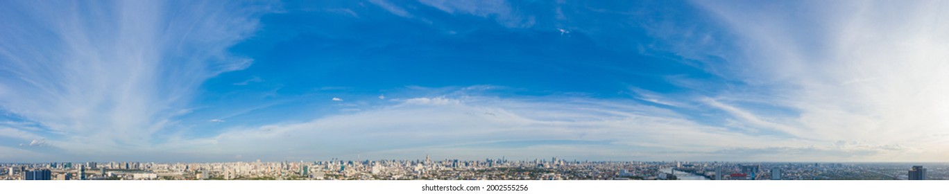 Supersize panorama blue sky with clouds on the sky as background. Sky in the middle of Bangkok