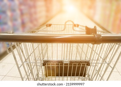 Superstore Trolley In A Supermarket, Grocery Shopping,product Selection,shelves In Hypermarket, Online Shopping Background