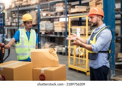 Supervisor, manager or boss to angry, scold or mad to worker, employee inside distribution warehouse about bad, damage, broken or dented of cardboard box package. May called carton, parcel, cargo.
 - Powered by Shutterstock