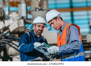 A supervisor mentors a technician using a rugged laptop beside a production machine in a manufacturing facility, showing digital supervision, faster troubleshooting, productivity, and process control.
