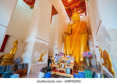 Suphanburi,Thailand - July 15 2017 : Big golden buddha statue in public Wat Palelaiworaviharn Temple at Suphanburi, Thailand. - Shutterstock ID 698992096