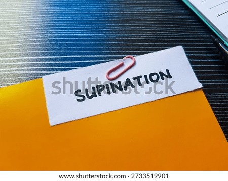 Supination writting on table background. 
