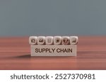 Supply chain management concept. Wooden blocks supply chain icons, Data for global logistics network, efficiency, optimization, integration.