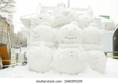 Supporo, Hokkaido, Japan 12 February 2018 : Group Of Snowman. One Of Small Snow Sculptures In The Contest And Show At The Snow Festival 2018 In Odori Park.