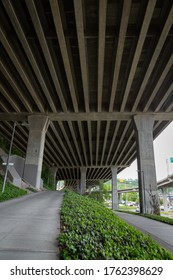 Support Beams Of The West Seattle Bridge Over A Pedestrian Trail