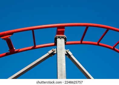 Support column and railway of small steel roller coaster closeup - Shutterstock ID 2248625757