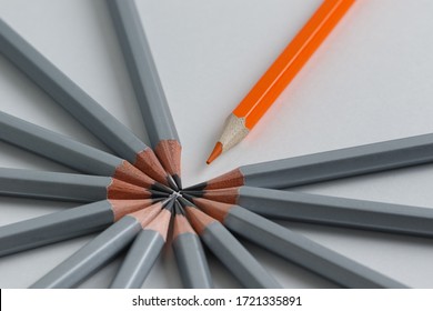 Support Group, Intervention. Conceptual. Orange And Gray Pencils Opposite Each Other