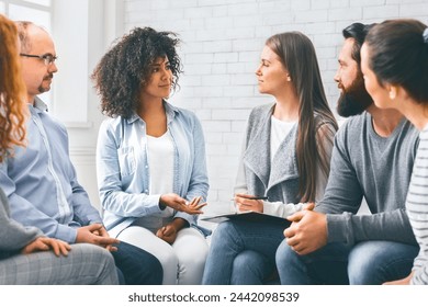 Support group meeting. Patients talking with professional therapist, panorama - Powered by Shutterstock