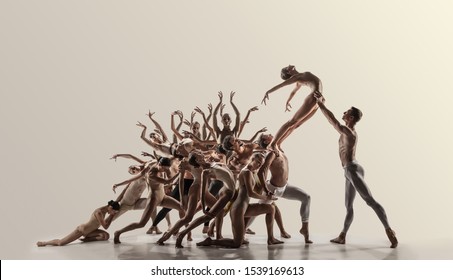 Support. Group Of Modern Ballet Dancers. Contemporary Art. Young Flexible Athletic Men And Women In Tights. Negative Space. Concept Of Dance Grace, Inspiration, Creativity. Made Of Shots Of 11 Models.