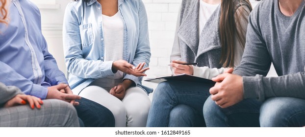 Support Group Therapy. Counselor With Clipboard Talking To Patients At Office, Panorama