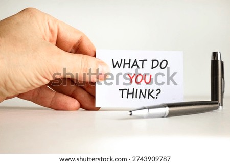 Support, help what do you think symbol. Concept words What do you think on beautiful white card. Beautiful white background. Businessman's hand. Business what do you think concept. Copy space.