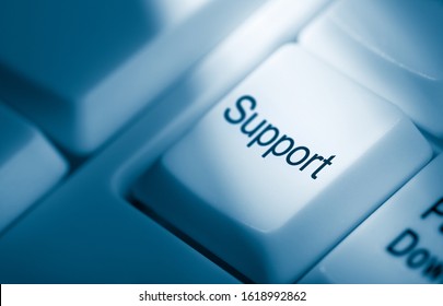 Support Key On Blue Toned Computer Keyboard