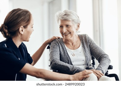 Support, nurse and senior woman in wheelchair for assistance, help or medical care in retirement home. Discussion, friendly caregiver and elderly patient with disability for wellness, health or trust - Powered by Shutterstock