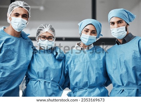 Support, portrait and doctors with face mask for surgery, healthcare and work in theater. Together, hospital and group of surgeons with a hug for medical collaboration, teamwork and cardiology