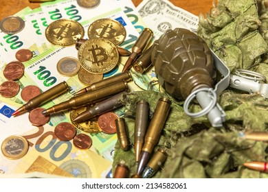 Support for Ukraine. War in Ukraine. Euro coins and banknotes and cartridges of different caliber. Sale of weapons. Ammunition for war