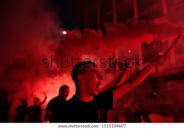 Supporters of the\
extreme far-right Golden Dawn party celebrate after the early\
election results, at the central offices of the Golden Dawn in\
Thessaloniki, Greece 17 June\
2012.