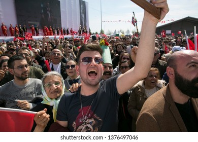 Supporters of Istanbul's new mayor Ekrem Imamoglu wave flags and chant slogans during a Republican People's Party (CHP) victory rally on April 21, 2019 in Istanbul, Turkey. 