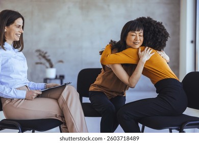 A supportive environment in a counseling session as group members express care and empathy through interaction.