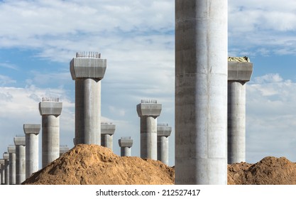 Supports of the bridge and sand