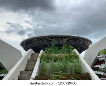 Supreme Court, Singapore - January 27 2021: Solar Punk, Sci-fi Vibes From Across Funan Roof Top Garden In Singapore. Urban Farming, Starring Across At The Supreme Court Flying Saucer. 