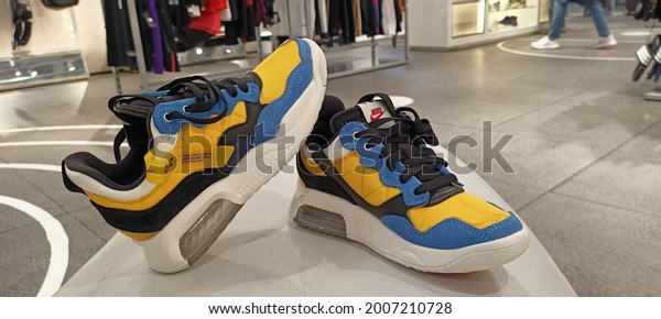 Surabaya, East Java,\
Indonesia, February 26, 2021. A brand new Nike shoe is display on\
the store. Nike is one of the world\'s largest suppliers of athletic\
shoes and apparel. 