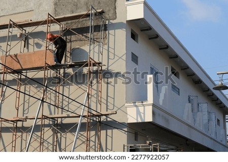 surabaya, east java, indonesia: scaffolding erected to assist with construction. March 11, 2023