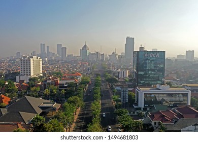 surabaya, east java - september 1st, 2019.  car free day on raya darmo street, surabaya.  aerial view of surabaya city