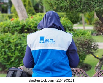 Surabaya, Indonesia - April 25, 2022: A Hijab Woman Volunteers From A Famous University 